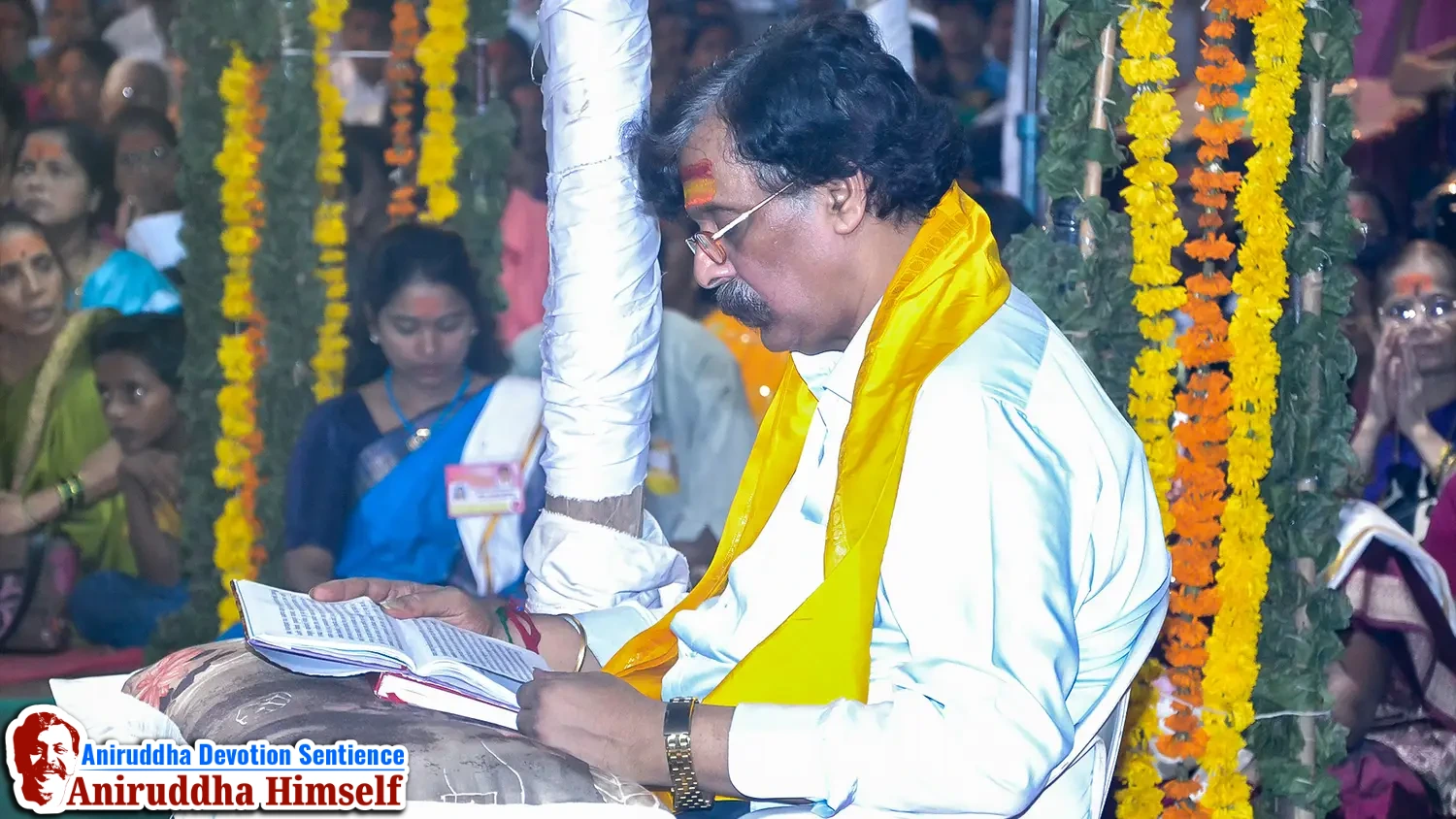 Sadguru Shree Aniruddha Bapu reads the sacred Grantha with respect and devotion during Shree Varada Chandika Prasannotsava at Shree Harigurugram