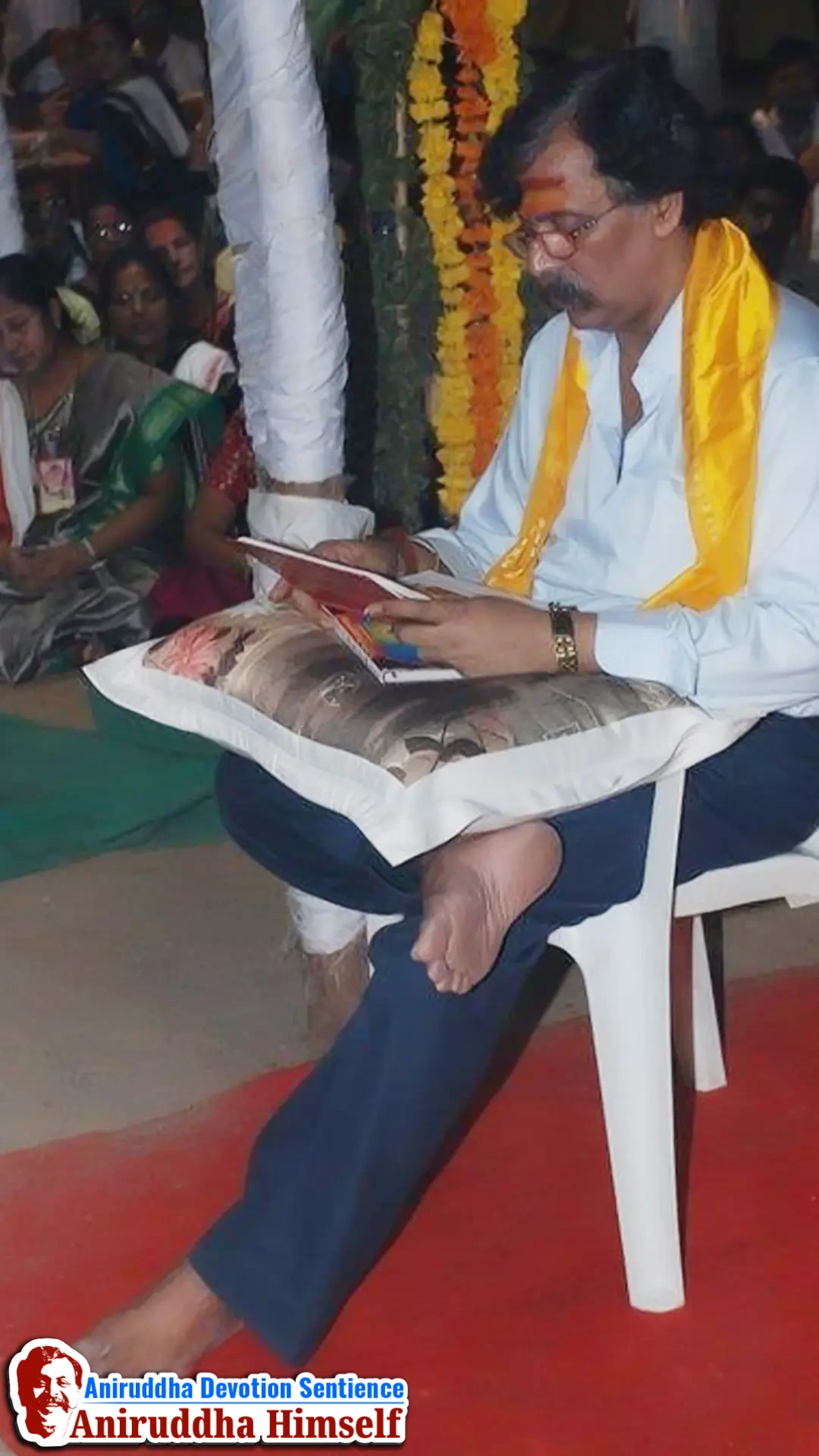 Sadguru Shree Aniruddha Bapu reads the sacred Grantha with respect and devotion during Shree Varada Chandika Prasannotsava at Shree Harigurugram