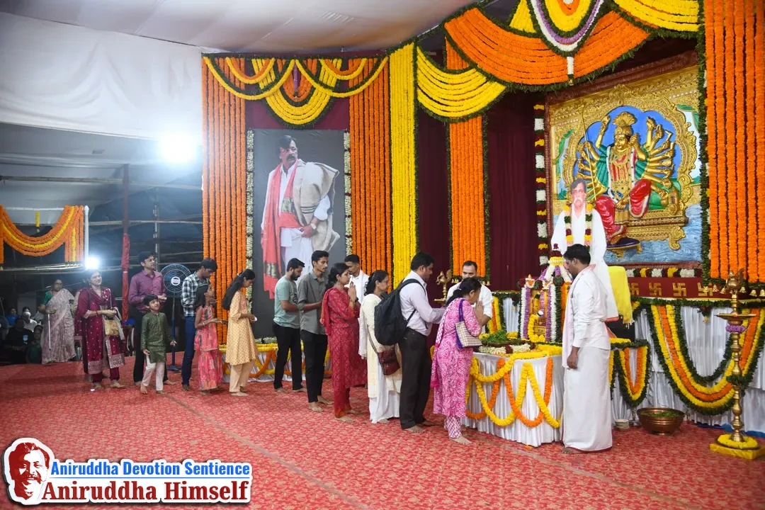Shraddhavans taking darshan of the Charan Mudra of Sadguru Shree Aniruddha Bapu during the Aniruddha Chalisa Pathan at Shree Harigurugram