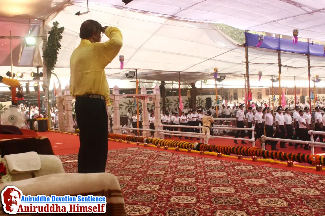 Sadguru Shree Aniruddha Bapu saluting the DMVs of Aniruddha Parade during the Aniruddha Pournima Utsav at Shree Harigurugram.