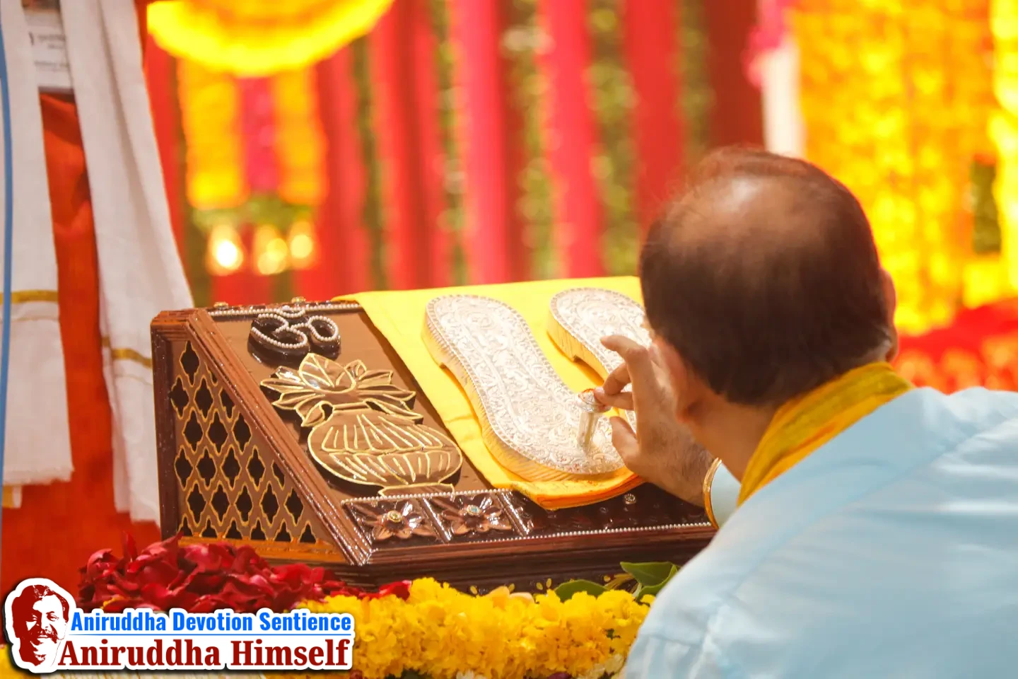Poojan being performed on Shree Krupachaitanya Padukas of Sadguru Shree Aniruddha Bapu at Shree Harigurugram